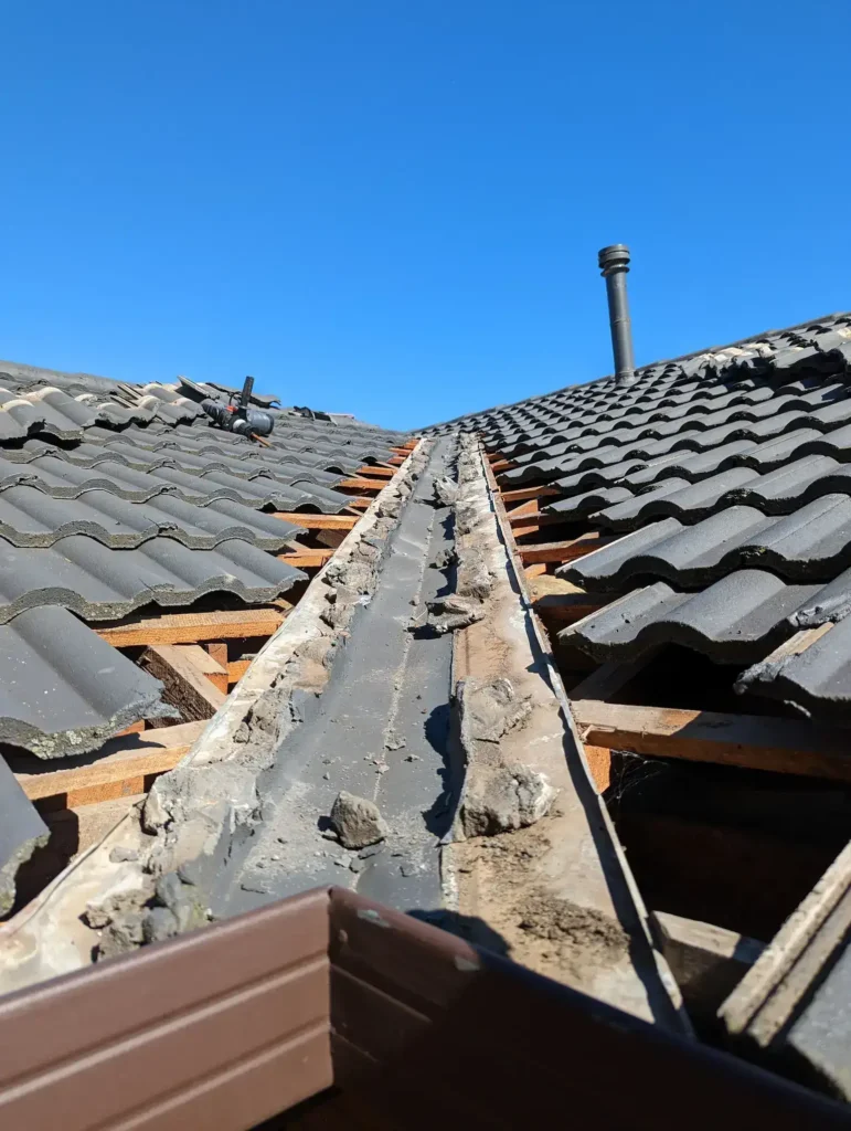 Process Of True Roof Removing An Old Valley Iron For Replacement In Melbourne